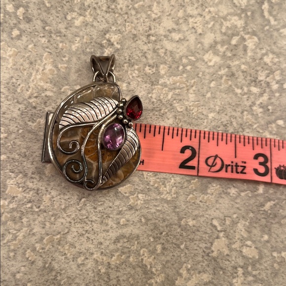 Ammonite Fossil .925 pendant with Red and Purple Gemstones - Picture 7 of 8